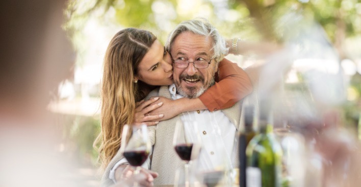 Father and daughter embrace